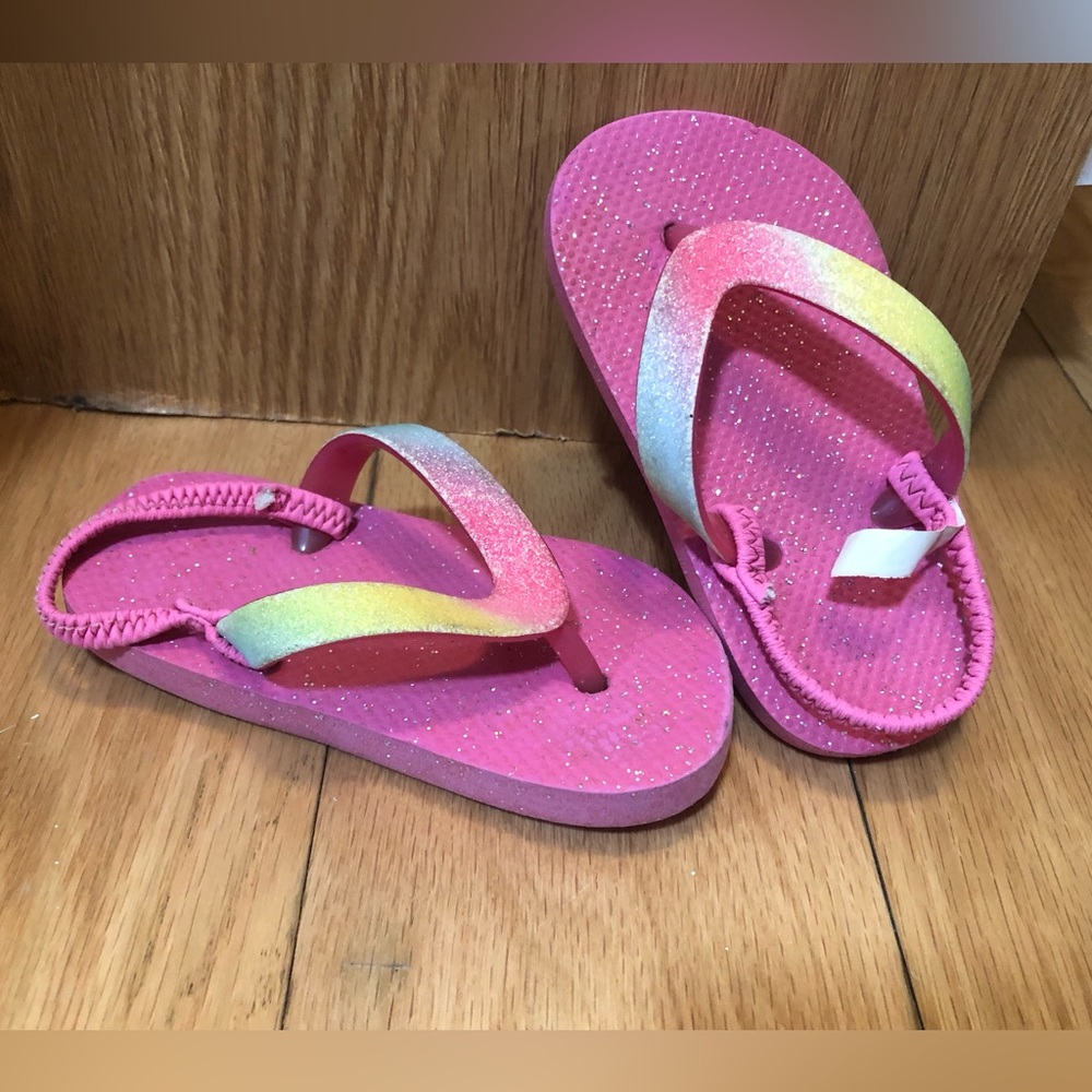 Pink flip flops 6/7
